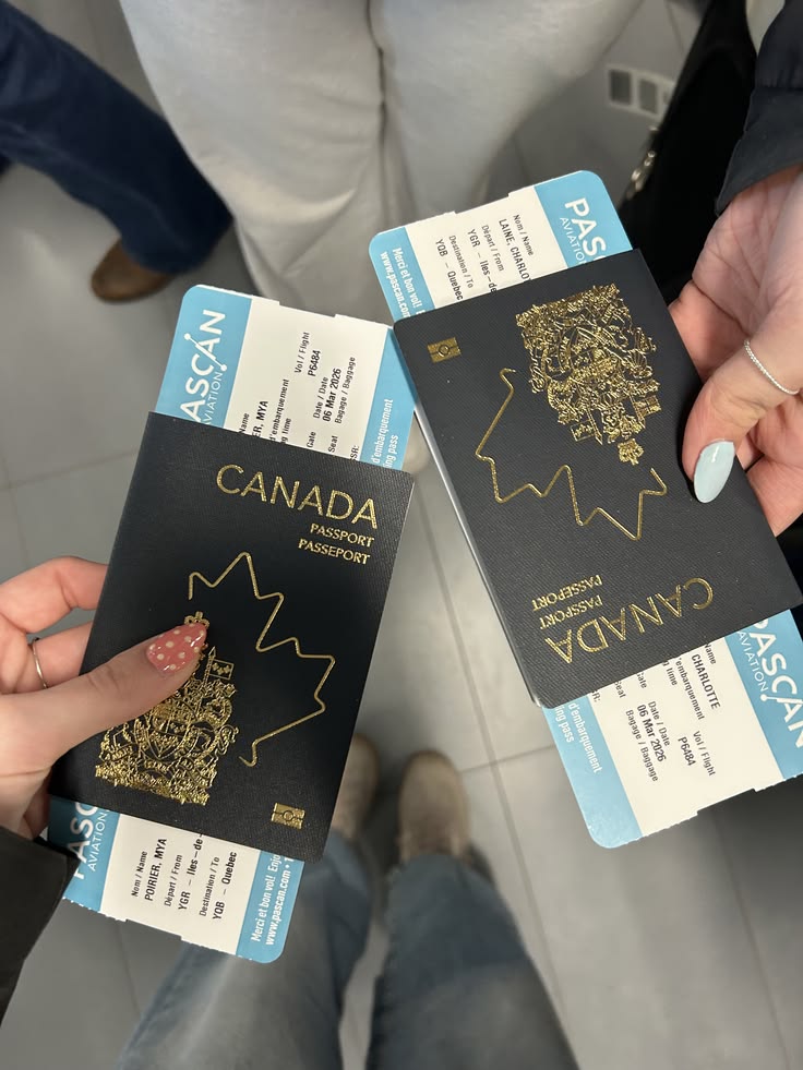 Canadian passport and travel papers pictured during a journey